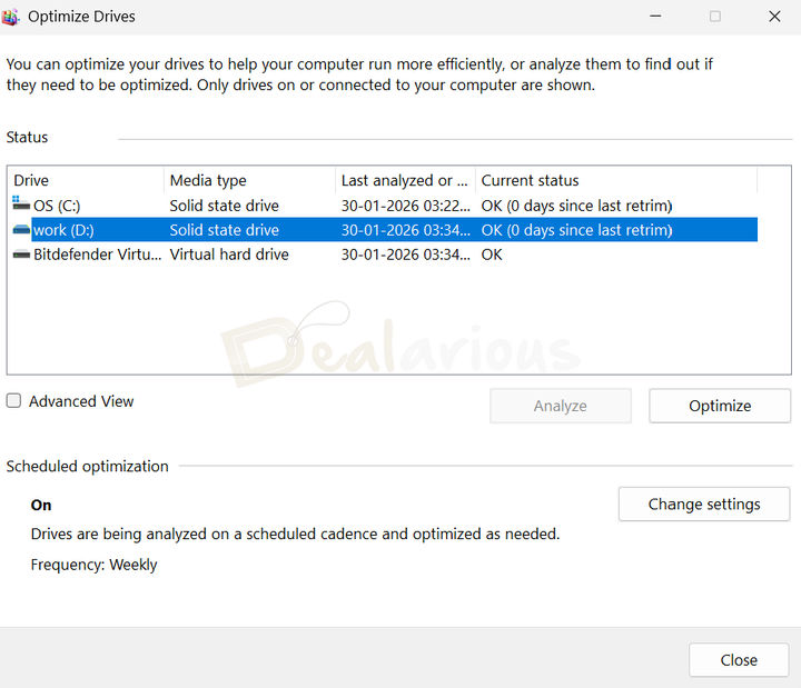 Windows 11 Drive Optimize Windows 11 Optimize Drives tool showing SSD status and scheduled optimization enabled.